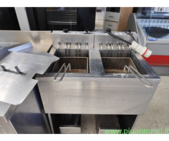 Cucine professionali, armadi refrigerati, banchi