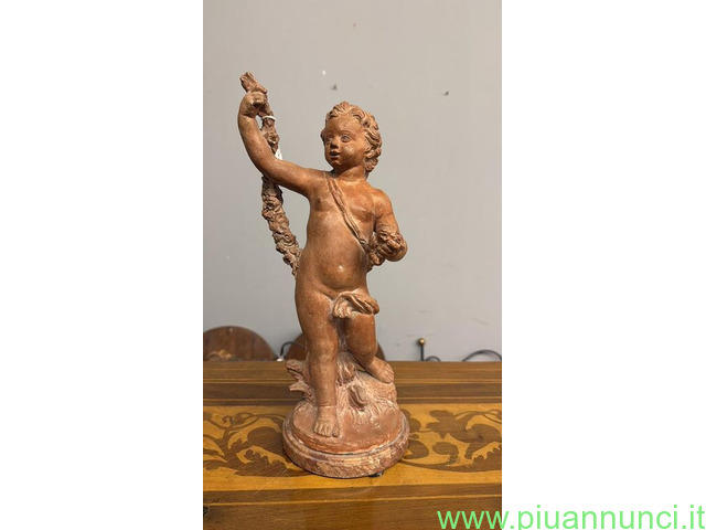 Antica scultura putto festante in terracotta 700 - 1